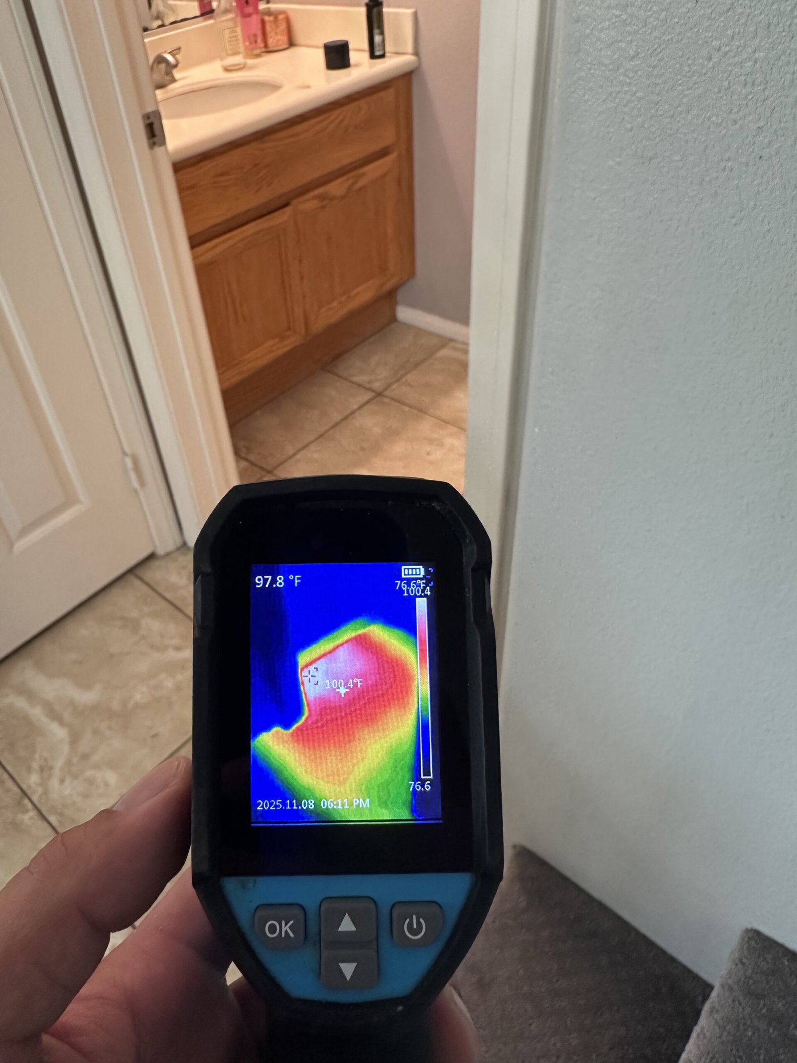 Warm floor leak detection showing signs of a slab leak, high water bill, gas meter spinning, and hidden moisture under flooring diagnosed by Plumbing Solution Specialist.